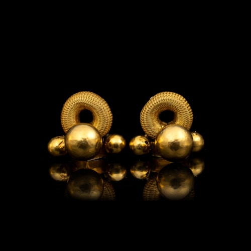 Thandatti and pampadam gold brooches.